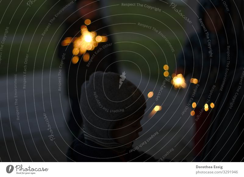 Child with sparkler Human being Infancy 3 3 - 8 years Allgäu Germany Village Terrace shoulder stand Sparkler Feasts & Celebrations Glittering Illuminate Yellow
