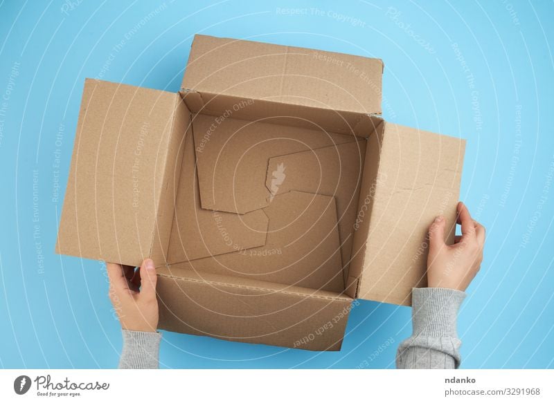 empty open box of brown cardboard Craft (trade) Mail Business Hand Bottom Transport Container Pack Paper Packaging Package Clean Blue Brown Yellow White