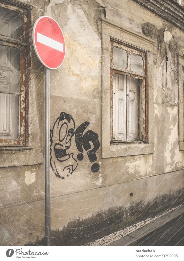 Urban image Graffiti Facade urban Town Wall (building) Window Architecture built Manmade structures Wall (barrier) Exterior shot Deserted Gloomy Old Gray