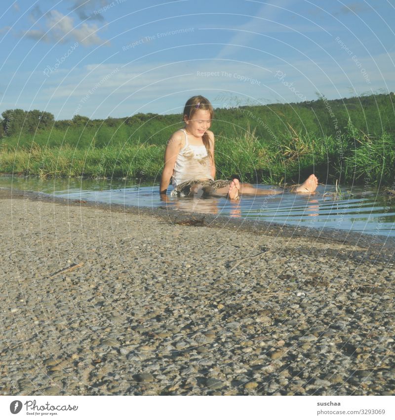 puddle seater Child Infancy Summer Warmth Exterior shot Landscape Nature Puddle Swimming & Bathing Joy Joie de vivre (Vitality) Dirty Mud Sit Litterbug Freedom