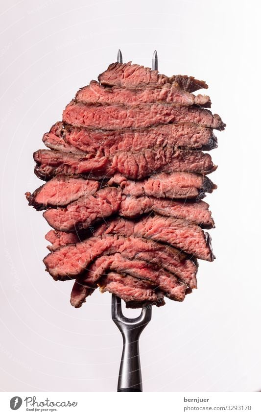 Steak slices Meat Dinner Fork Media Stone Dark Thin Juicy Red Black White Quality Butcher barbecue Rib eye steak Fat BBQ Seldom Background picture segregated