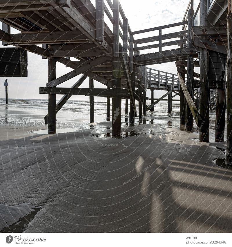 Under a jetty on the North Sea coast Relaxation Cure Swimming & Bathing Vacation & Travel Tourism Adventure Environment Nature Climate Beautiful weather Waves