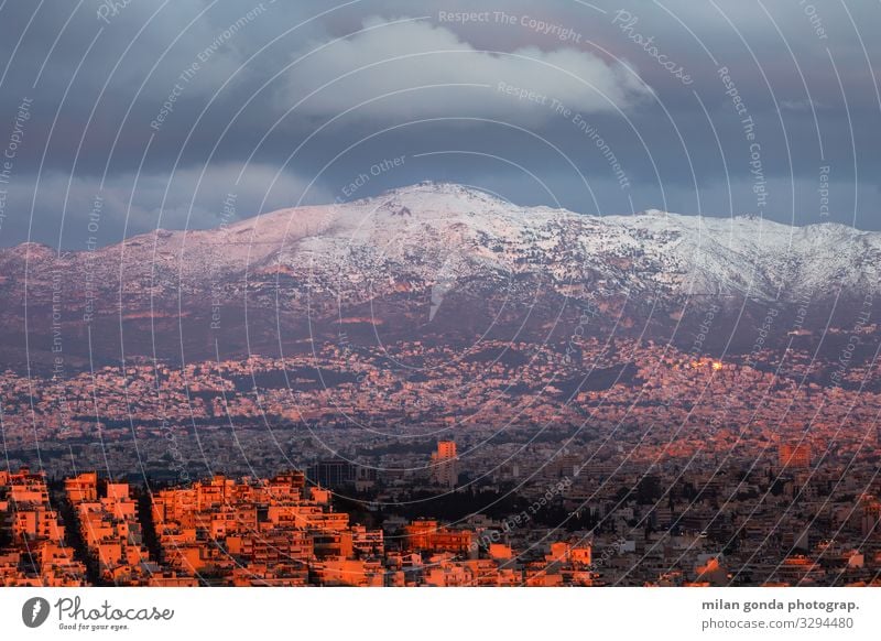 Athens. Winter Snow Mountain Cold Europe Mediterranean Greece Greek Attica Lycabettus cityscape Sunset Pentali Pentalicus City Evening