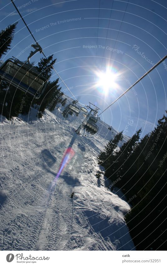 Lift in backlight Chair lift Switzerland Back-light Crap Soign Gion Laax Mountain Sun Snow