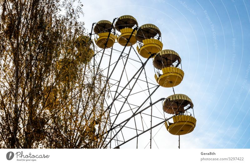 old carousel wheel in an abandoned amusement park in Chernobyl Vacation & Travel Tourism Trip Nature Landscape Sky Autumn Tree Leaf Park Rust Old Threat Blue