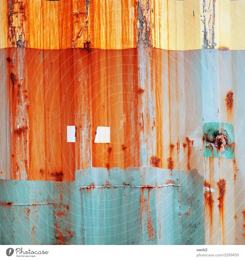 in progress Container Tin Corrugated sheet iron Metal Rust Blue Multicoloured Yellow Orange Turquoise Transience Change Destruction Dye Smear Tracks