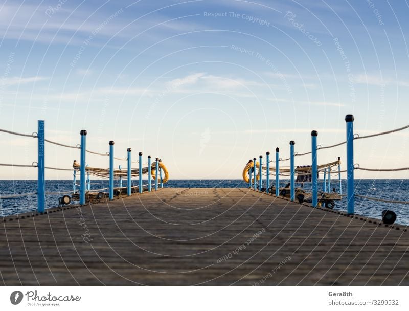 wooden platform with blue posts with ropes in Egypt Dahab Exotic Vacation & Travel Summer Ocean Nature Landscape Sky Clouds Horizon Warmth Wood Blue Red Sea