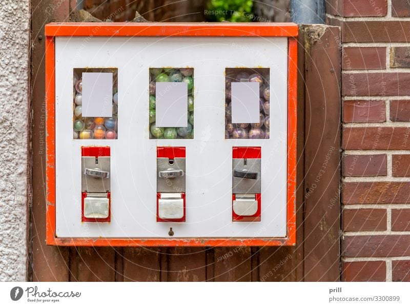 Gumball machine Candy House (Residential Structure) Machinery Manmade structures Building Wall (barrier) Wall (building) Facade Brick Old Small Red White