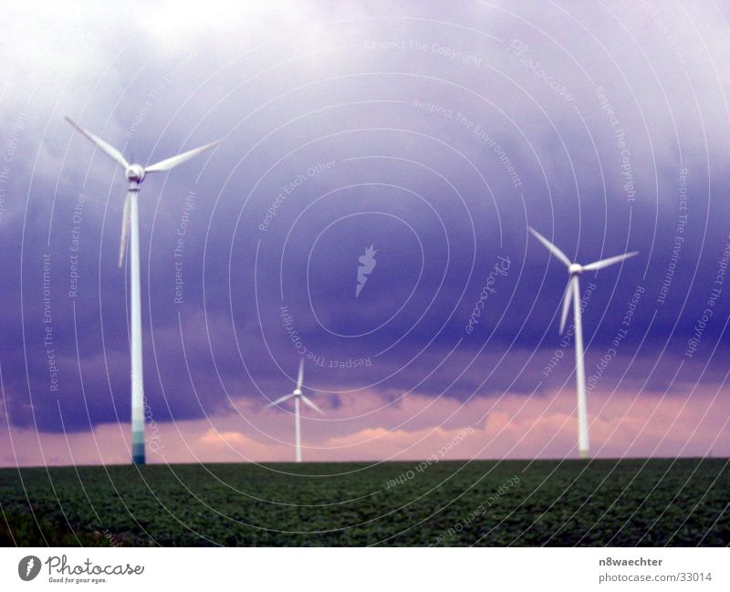 Wind power-1 Clouds Play of colours Dark Storm Wind energy plant Tower Contrast