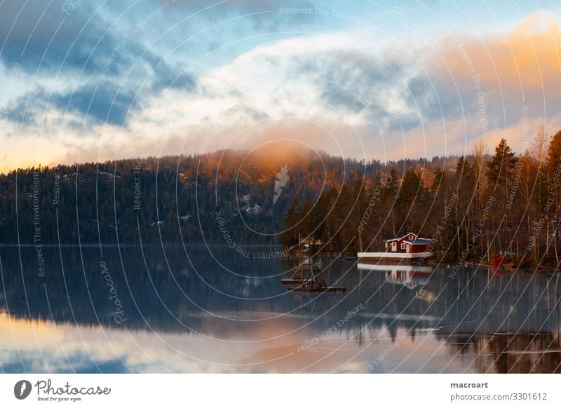 house on the lake Lake Frozen icy Snow Norway Scandinavia Snowscape Footbridge Coast Lakeside River bank Mountain lake Winter Water Body of water Cold Fog Dusk