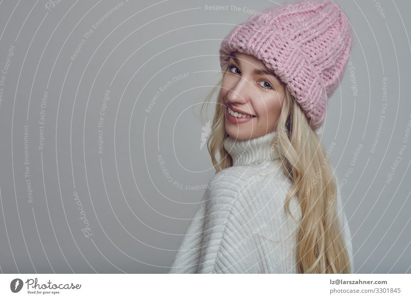 Smiling young woman in pink knitted winter hat Happy Beautiful Face Winter Woman Adults 1 Human being 18 - 30 years Youth (Young adults) Warmth Forest