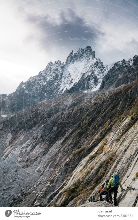 glacier climbing Nature Landscape Earth Sky Storm clouds Alps Mountain Snowcapped peak Glacier Fitness Sports Adventure hiking Hiking trip trek Colour photo