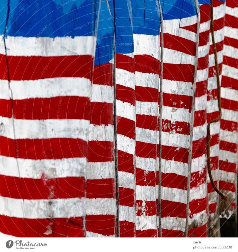 STRIPES WITHOUT STARS Harbour Facade Wood Sign Stripe Flag Blue Red White American Flag USA Multicoloured Exterior shot Pattern Deserted Copy Space top Day