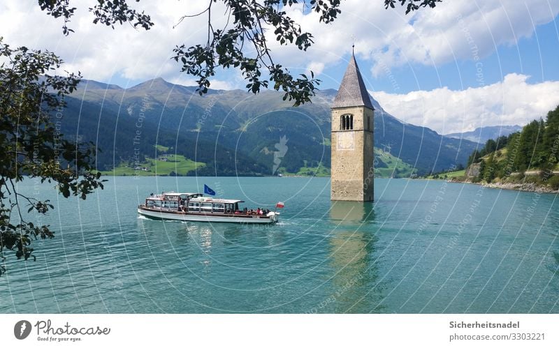 Reschensee Tourism Trip Nature Water Summer Beautiful weather Alps Mountain Lake Lake Reschen Church Boating trip Watercraft Blue South Tyrol Italy Reservoir