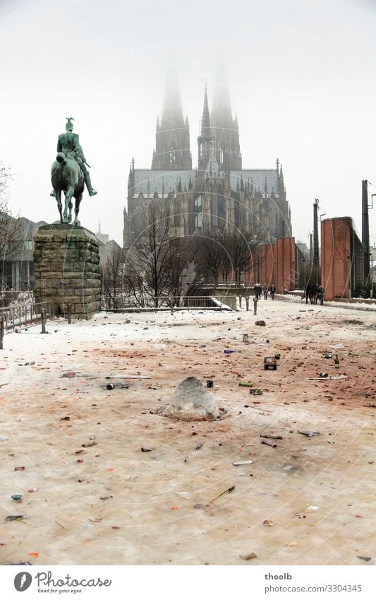 Remains of New Year's Eve in the snow at Cologne Cathedral Winter Snow Art Sculpture Architecture Culture Party Environment Climate Climate change Fog Town