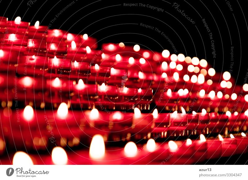 Group of red candles in church for faith resurrection prayer Candle Love Power Peace Belief Religion and faith Death Grief hope faithful sacrifice silence soul