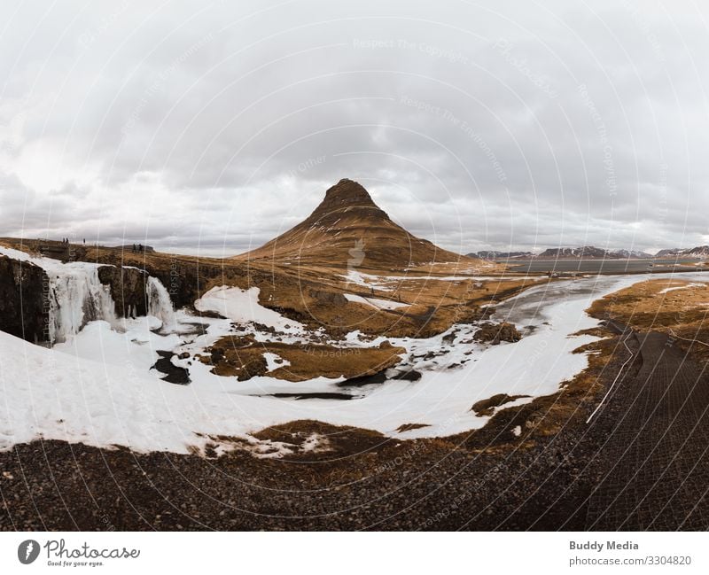 Kirkjufellsfoss on the Snaefellsnes Peninsula in Iceland Expedition Winter Mountain Nature Landscape Earth Sand Water Sky Clouds Spring Weather Snow Drought