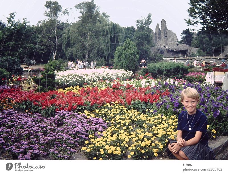 sea of flowers Feminine girl 1 Human being Horizon tree Flowerbed Garden Mountain Shirt Dress Jewellery Blonde Short-haired To hold on Looking Sit Wait great