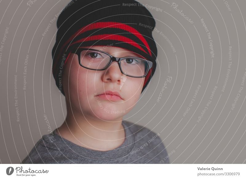 Young Boy Child Boy (child) 1 Human being 3 - 8 years Infancy Eyeglasses Hat Authentic Near Uniqueness childhood Calm Still Life Interior shot natural light