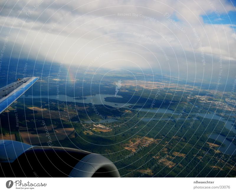 Rainbow from the Sky Aerial photograph Airplane Wing Lake Clouds Forest Water Berlin Engines Far-off places View from the airplane