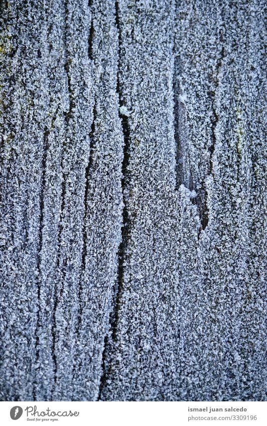 snow and ice on the wooden table in winter season frost frozen snowfall frosty abstract background white water wet textured pattern surface nature macro closeup