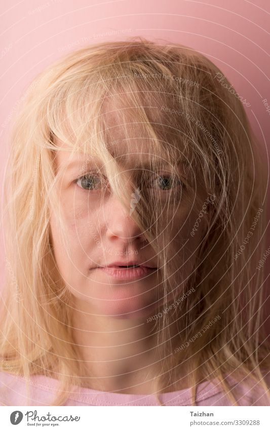 Portrait of the beautiful young woman with magnificent light hair, bangs on the face. close up. Human being Feminine Face Eyes 1 30 - 45 years Adults