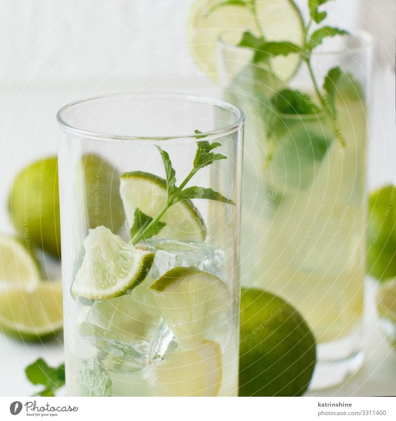 Homemade refreshing drink with lime juice and mint Fruit Beverage Lemonade Juice Summer Leaf Cool (slang) Fresh Natural Yellow Green White Mint citrus glass