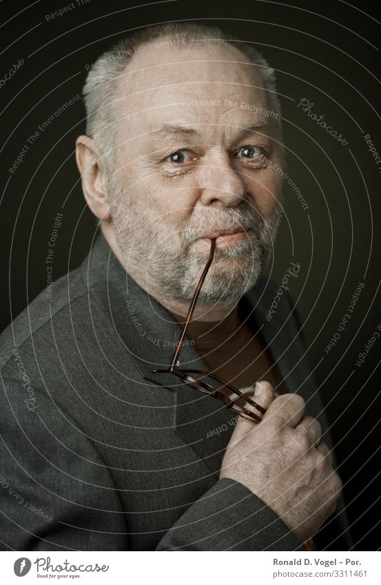 Older man with beard and glasses in a suit looks directly into the camera. Human being Masculine Man Adults Father Grandfather Senior citizen 1 45 - 60 years