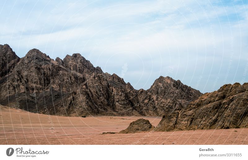 rocky mountains in the desert in egypt Vacation & Travel Tourism Trip Sightseeing Summer Mountain Nature Landscape Sand Sky Clouds Climate Hill Rock Stone Hot