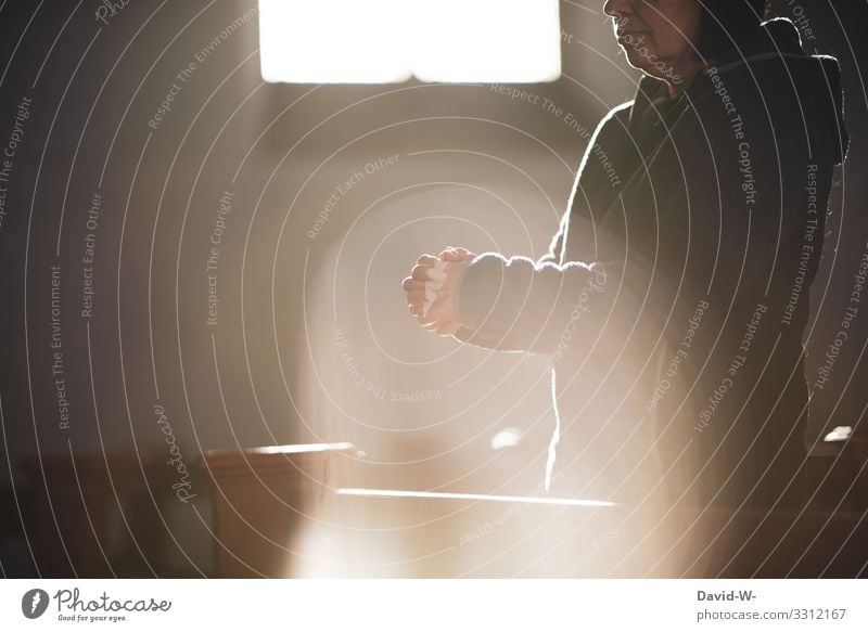 Woman in church in prayer Church Prayer hands God Belief sunshine Sunlight Church window Jesus Christ Remember Grief Hope corona coronavirus Crucifix