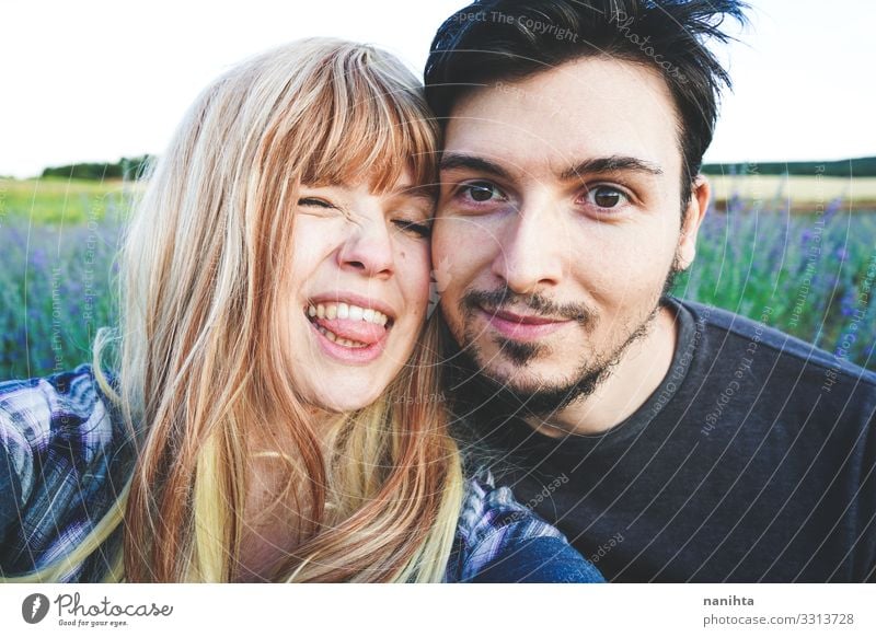 Real young couple enyoing a sunny day together Lifestyle Happy Beautiful Face Sun Human being Masculine Feminine Young woman Youth (Young adults) Young man