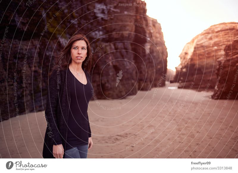 Young woman in Cathedrals Beach in Spain young ribadeo beach cliff catedrales catedrais girl ocean coast natural spain sea summer rock arch nature travel