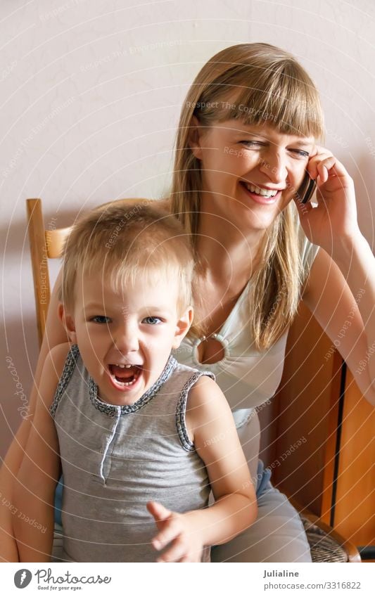 Screaming kid and mother with phone Child Schoolchild To talk Telephone Human being Baby Boy (child) Woman Adults Man Mother Family & Relations Infancy