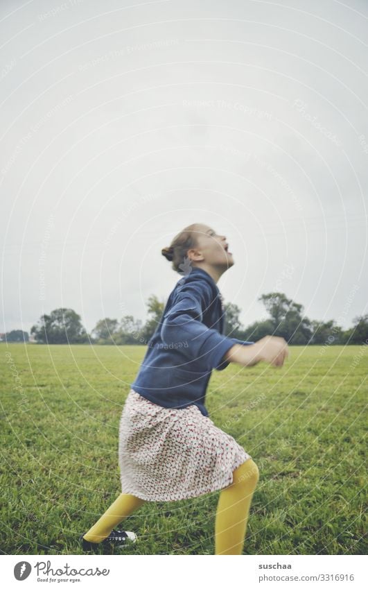 where did the balloon take off Child Girl Field Exterior shot Movement Playing Aloof Lanes & trails Vanished Upward beyond the range of vision Balloon