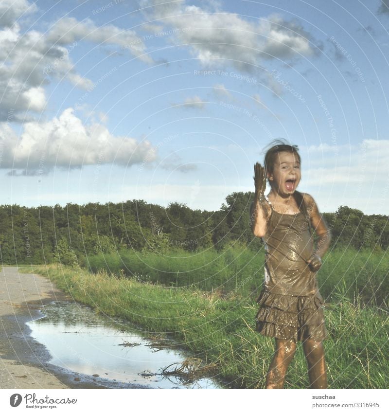 Be happy Child Girl Infancy Freedom Happy Playing Dirty Mud Puddle Exterior shot Nature Footpath Sky Joy Joie de vivre (Vitality) Swinishness sawn in Parenting