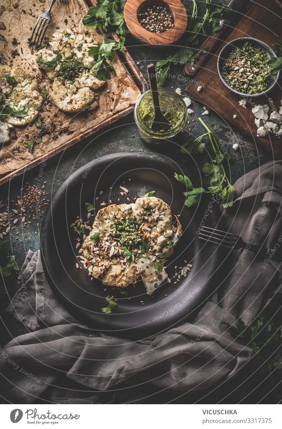 Cauliflower steak with kale pesto and pine nuts Food Vegetable Herbs and spices Organic produce Vegetarian diet Diet Crockery Plate Design Healthy Eating