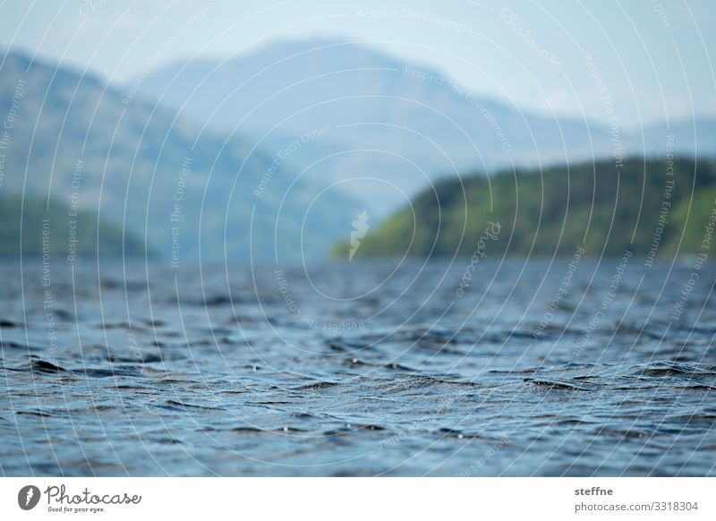 Loch Lomond Landscape Beautiful weather Mountain Peak Waves Coast Lakeside Bay Fjord Blue Scotland Highlands Surface of water Vision Shallow depth of field