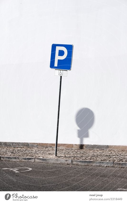 Strange world Wall (barrier) Wall (building) Traffic infrastructure Road traffic Sign Signs and labeling Road sign Uniqueness Funny Rebellious Blue White