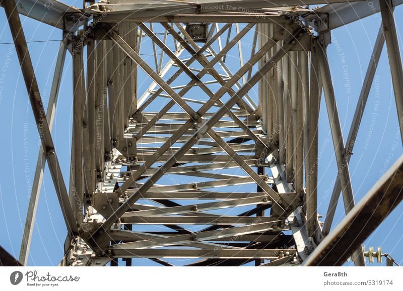 fragment of the structure of the tower of the high voltage line Industry Technology Sky Architecture Metal Steel Line Old Blue Energy background beam cable City