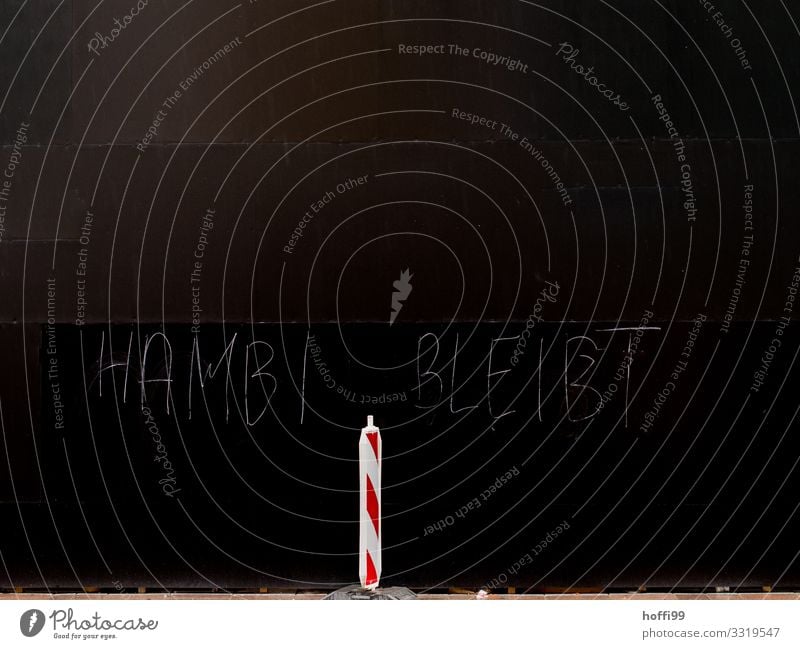 HAMBI STAYS Climate change Manmade structures Wall (barrier) Wall (building) Facade Countdown marker Barrier Characters Signs and labeling Signage Warning sign