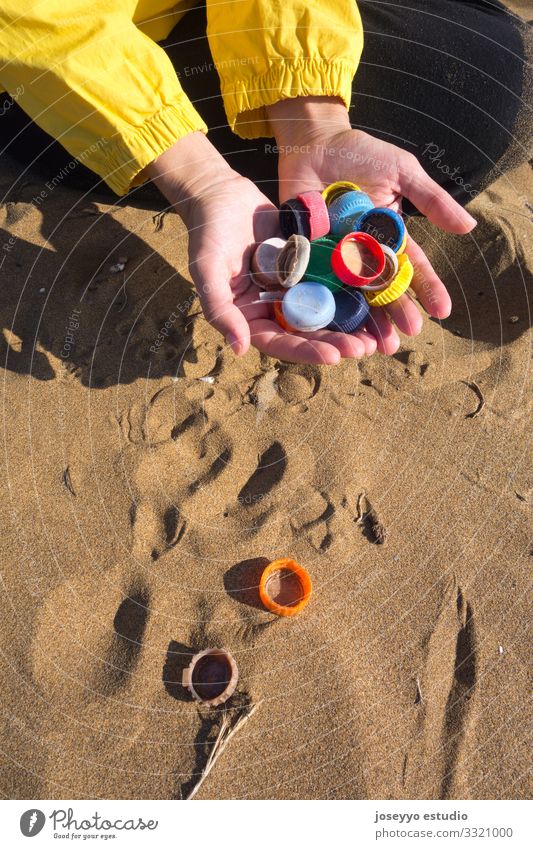 Hands full of plastic plugs collected on the beach. Beach Ocean Activist Awareness challenge Clean Coast Collect Education Environment Free Future micro Plastic