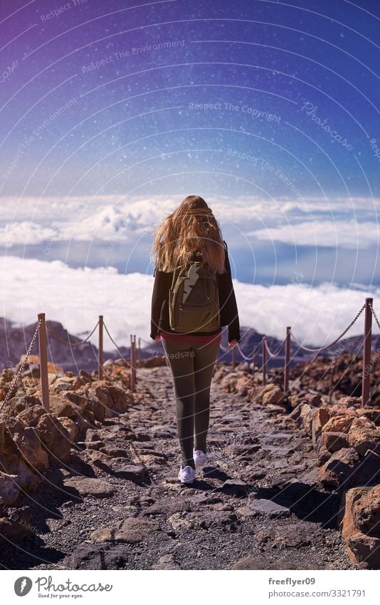 Young woman hiking the Teide Volcano in Tenerife Beautiful Vacation & Travel Tourism Adventure Summer Island Mountain Hiking Human being Feminine