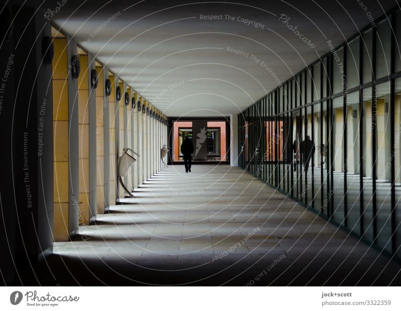 Gait pattern Corridor Column Glas facade Lanes & trails Going Sharp-edged Long Modern Gray Moody Protection Serene Center point Symmetry Environment