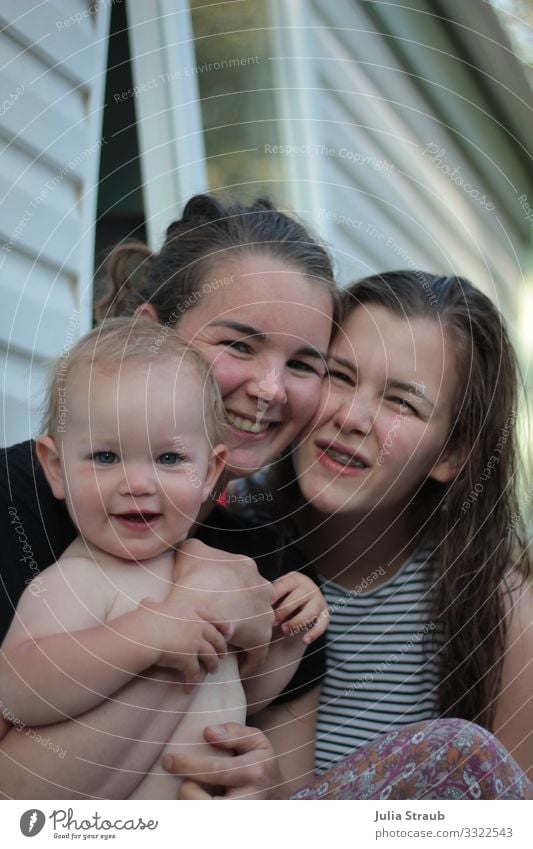 Mother with children laughing in front of the veranda at the house Feminine Toddler girl Young woman Youth (Young adults) Adults Family & Relations 3