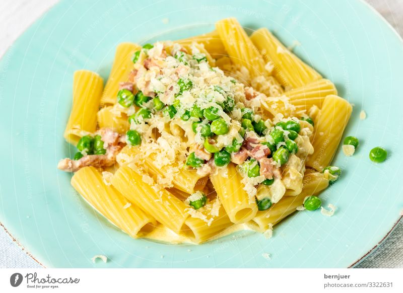 Rigatoni alla emiliana Cheese Vegetable Nutrition Dinner Plate Fork Table Gastronomy Green Red rigatoni Peas Parmigiano Mediterranean Italy Cooking Parmesan