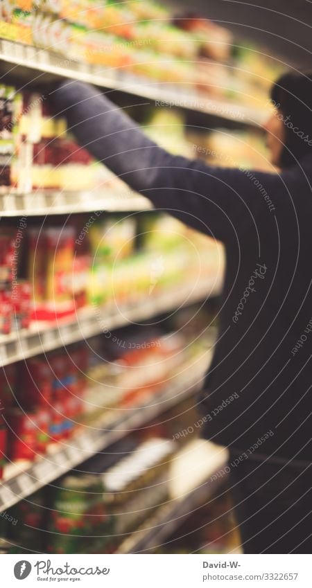 A woman reaches for a product in a grocery store Store premises shopping mall Shopping Woman Deep depth of field Grasp Product Food Shelves Merchant purchasing