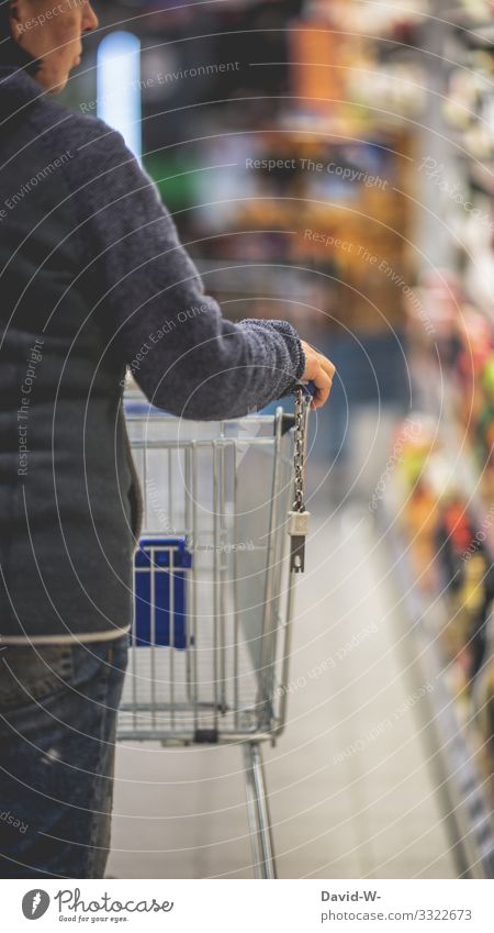 Woman with shopping cart in the shop Shopping Trolley search despair Empty sold out Food Expensive Prices Economy Offer hamster purchases Fear