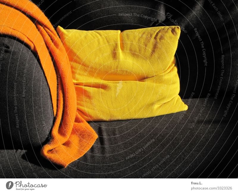 Sofa corner Living or residing Flat (apartment) Living room Yellow Orange Black Multicoloured Cushion Blanket Wool blanket Colour photo Interior shot