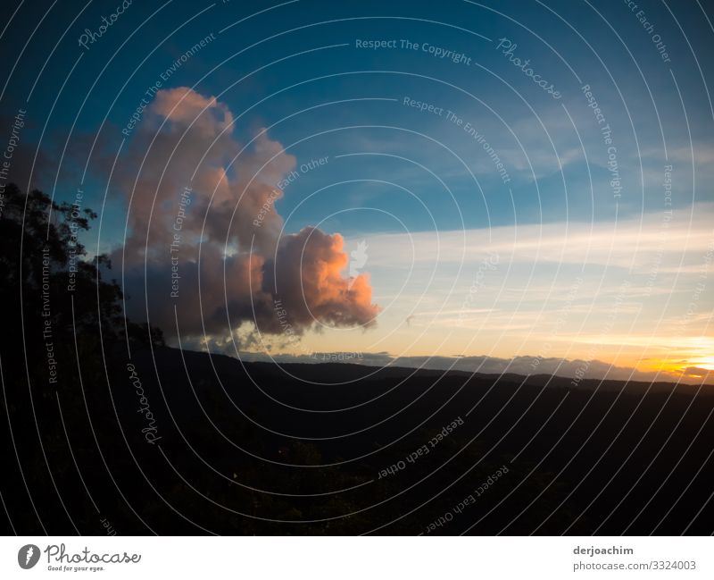 A sky dragon over the land. A cloud formation that looks like a dragon. Joy Relaxation Trip Environment Beautiful weather Hill Queensland Australia Deserted