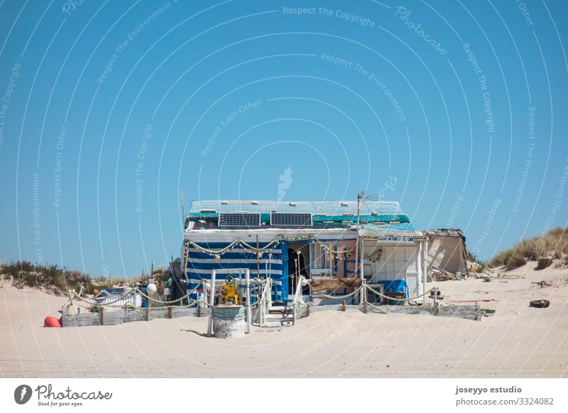 Fisherman's cabin on the beach Andalucia Atlantic Ocean Beach Blue Watercraft Hut Coast Destination donana Dune Environment House (Residential Structure) Huelva